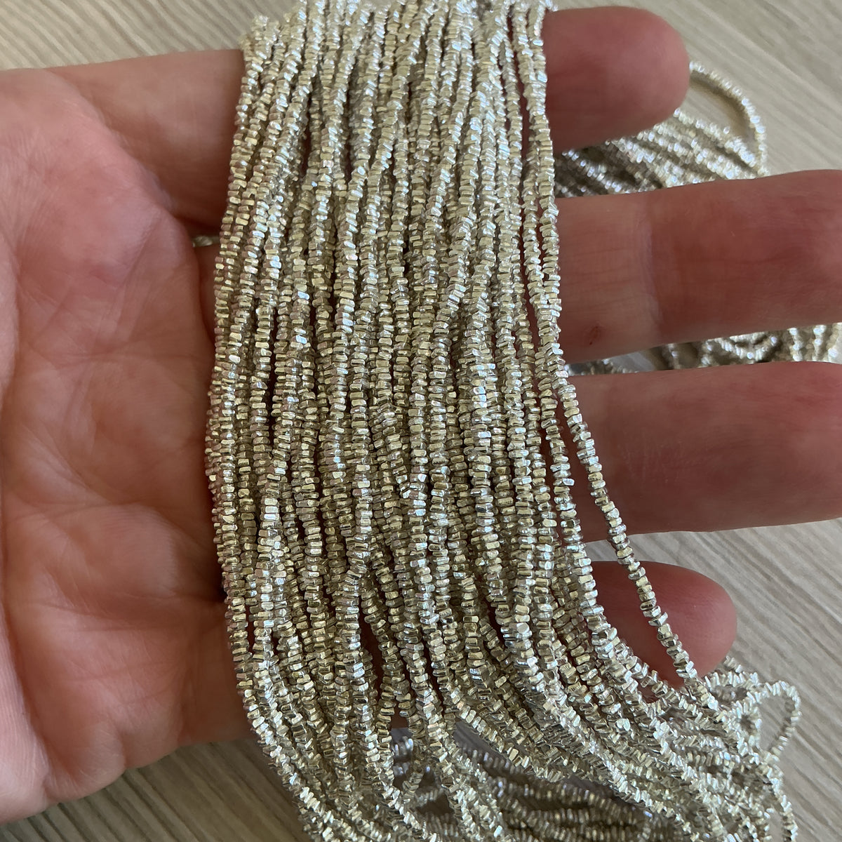 Long Strands of Very Tiny Flat Square Sterling Silver Beads from the Thai Karen Hill Tribe - Rita Okrent Collection (NP108b)