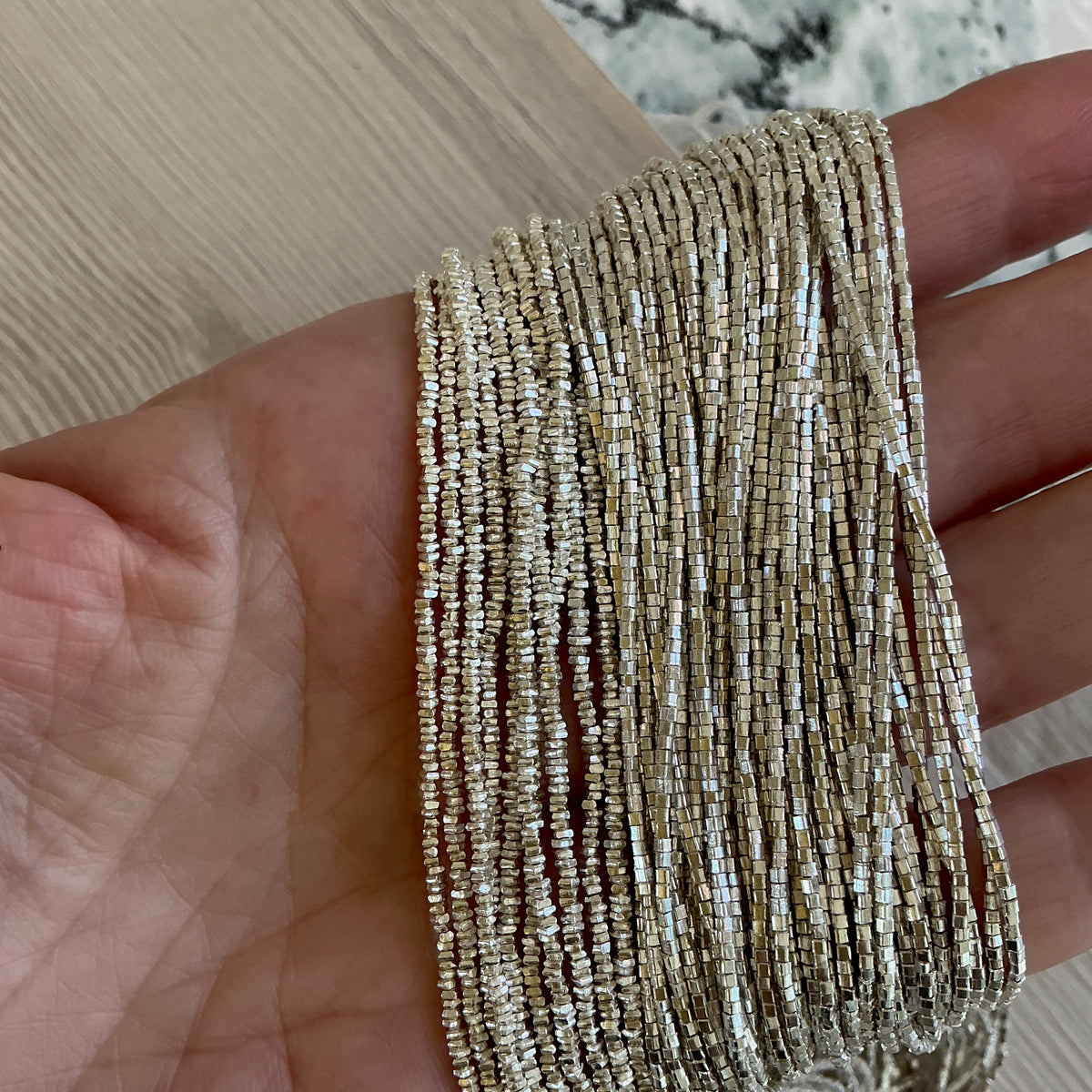 Long Strands of Very Tiny Flat Square Sterling Silver Beads from the Thai Karen Hill Tribe - Rita Okrent Collection (NP108b)