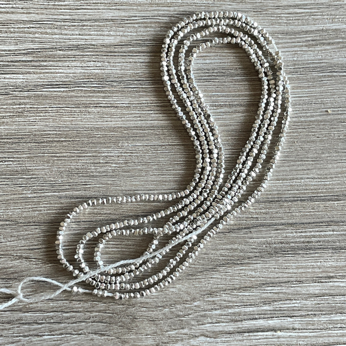 Long Strands of Tiny Faceted Sterling Silver Beads from the Thai Karen Hill Tribe - Rita Okrent Collection (NP104)