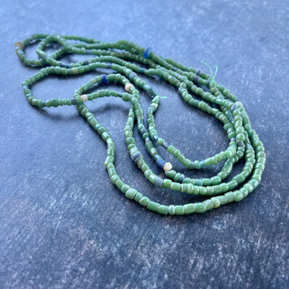 Small Antique Green Glass Tradewind - Nila Beads from the African Trade - Rita Okrent Collection (AT1917)