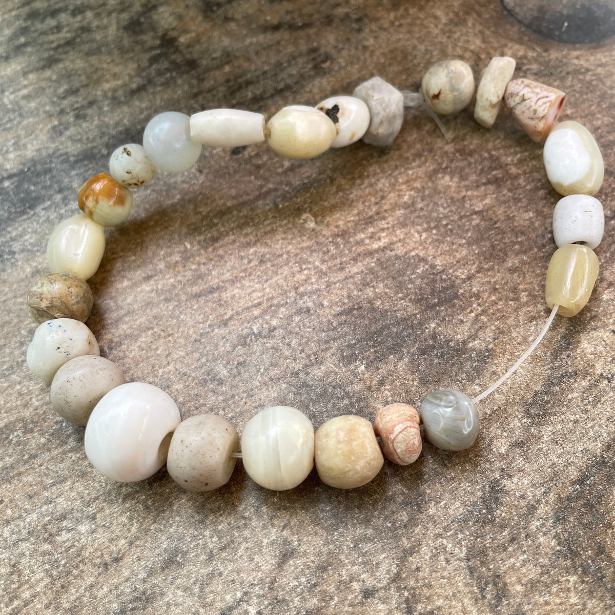 Strand of 23 Antique Mother-of-Pearl, Stone, and Glass Beads - Rita Okrent Collection (ANT440)