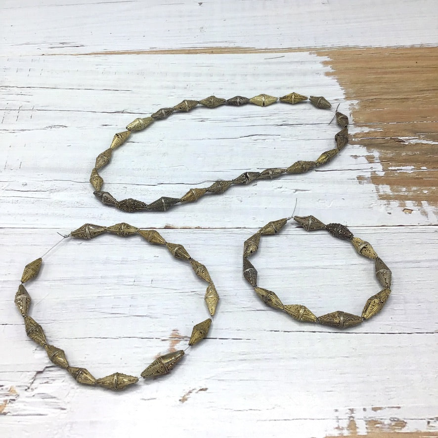 Strand of 14 Gilded / Silver Granulated Bicone Beads from Mauritania, Missing Some Granulation - Rita Okrent Collection (ANT540b)