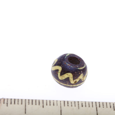 Ancient Glass Bead, Black with Yellow Trails, Middle East - Rita Okrent Collection (AG073f)