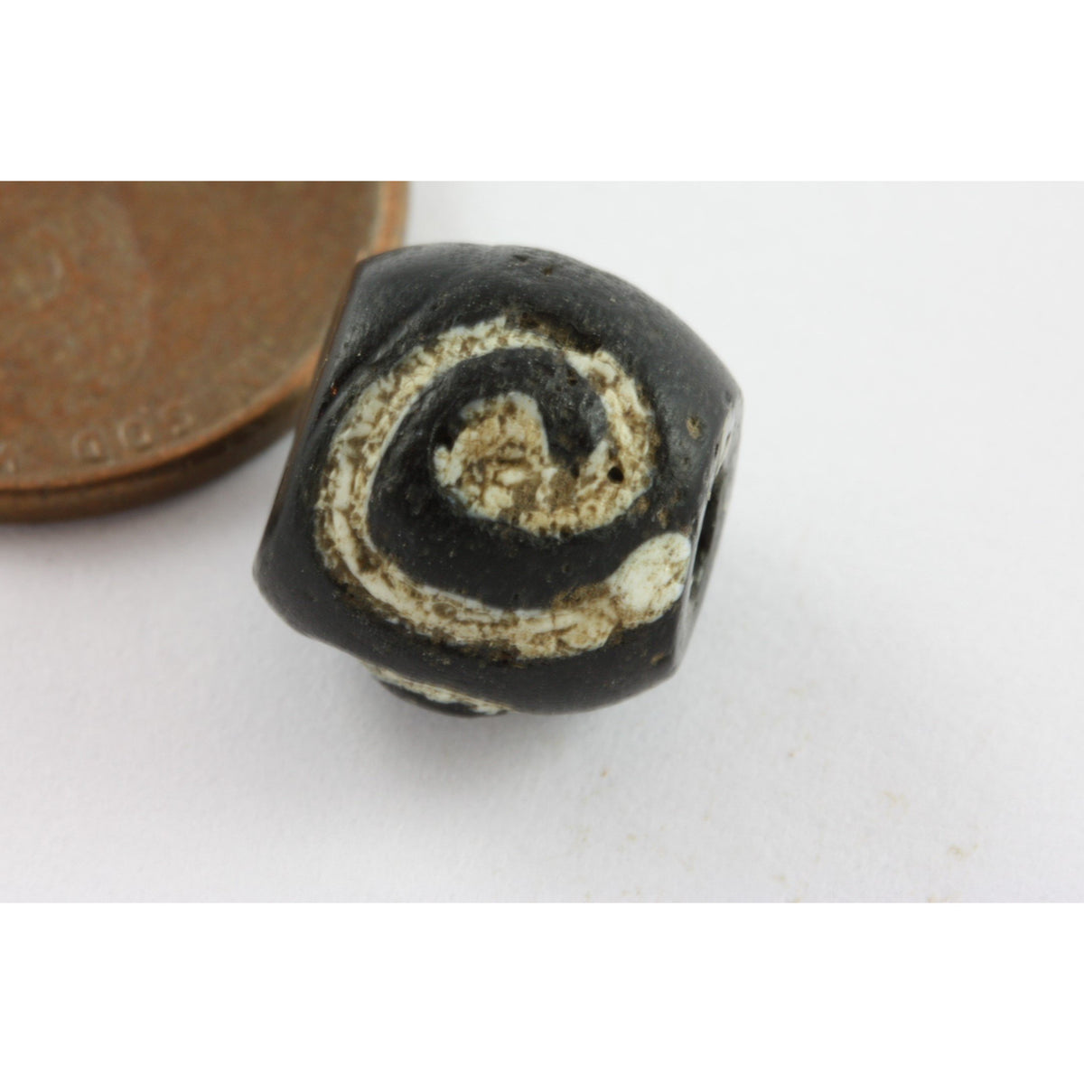 Ancient Black Islamic Bead with White Spiral Design, Egypt 