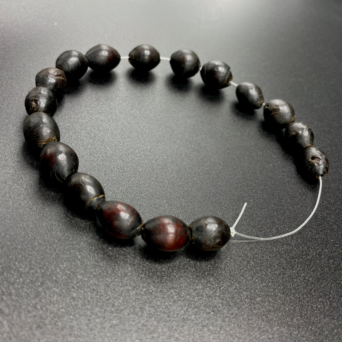 Strand of 17 Oval Shaped Black Coral Beads from an old Yemeni Prayer Strand - Rita Okrent Collection (ANT535)