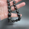 Strand of 17 Oval Shaped Black Coral Beads from an old Yemeni Prayer Strand - Rita Okrent Collection (ANT535)