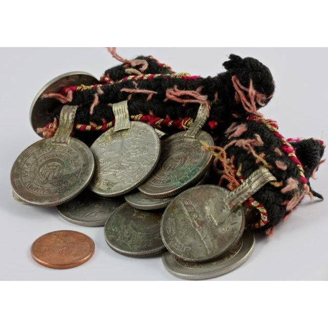 Vintage Kuchi Tribal Coins on Old Textile