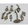 Collection of 9 Small Vintage Silver Pendants, North Africa