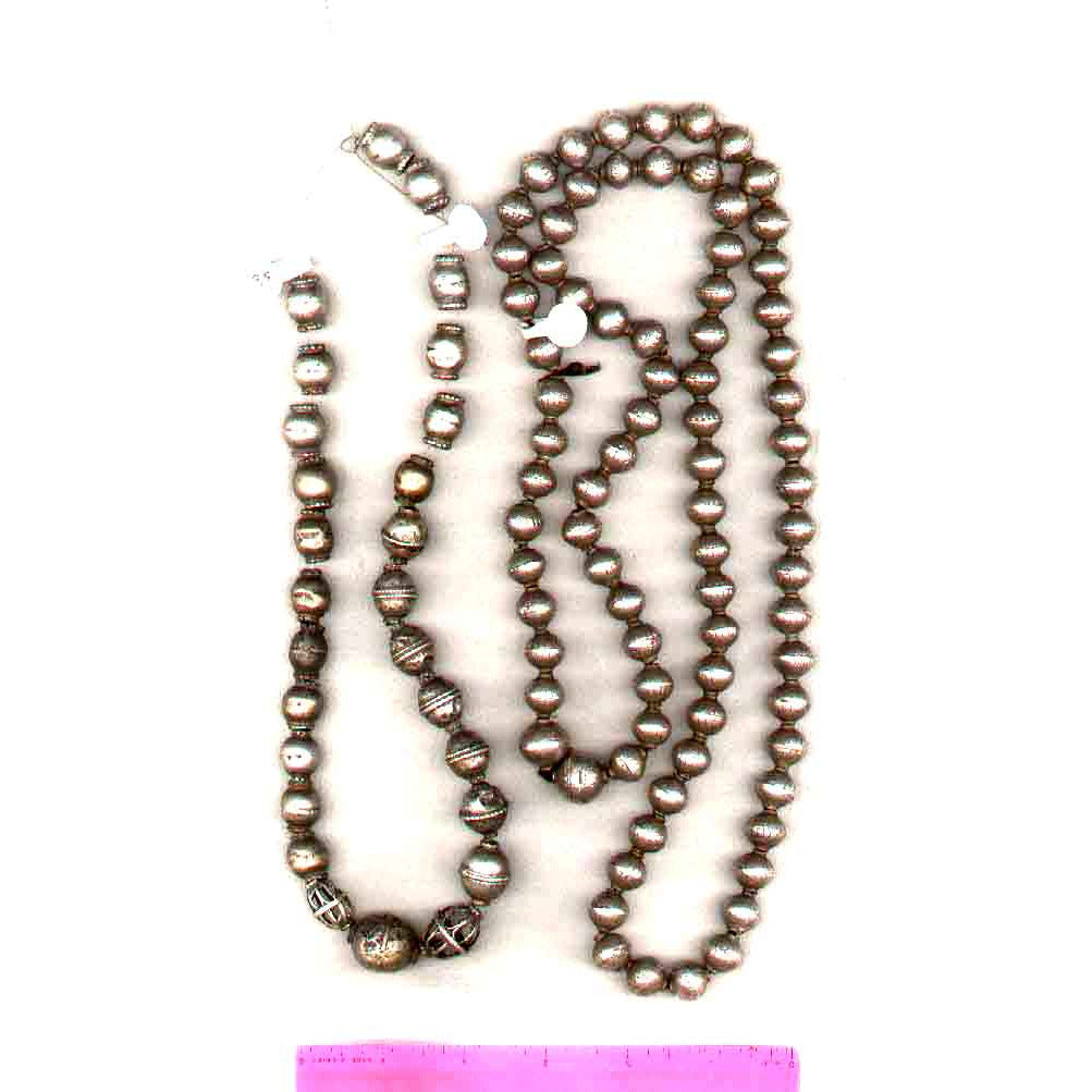 Hand-made silver beads