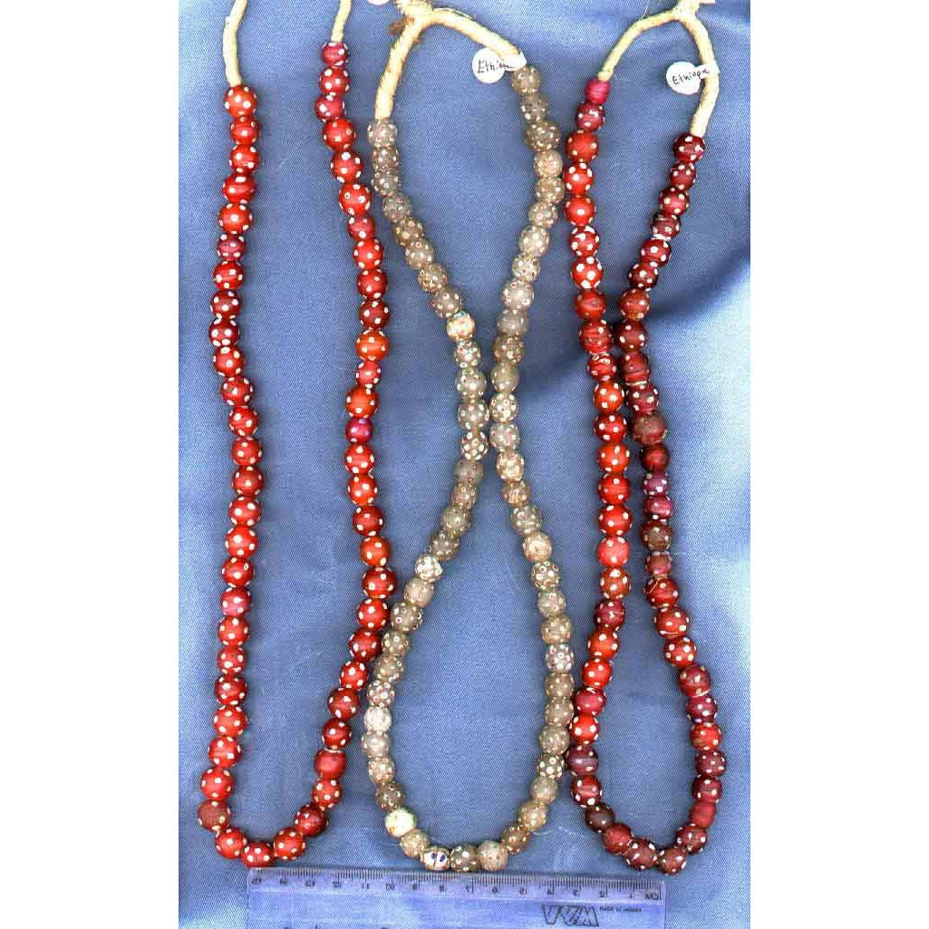 Red skunk Venetian Trade beads, mixed shadesTraded in Africa, late 19th century