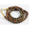 Matched red, yellow, black and green decorative African Trade  bead, old, Nigeri
