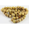 Pale yellow glass beads from China, Antique