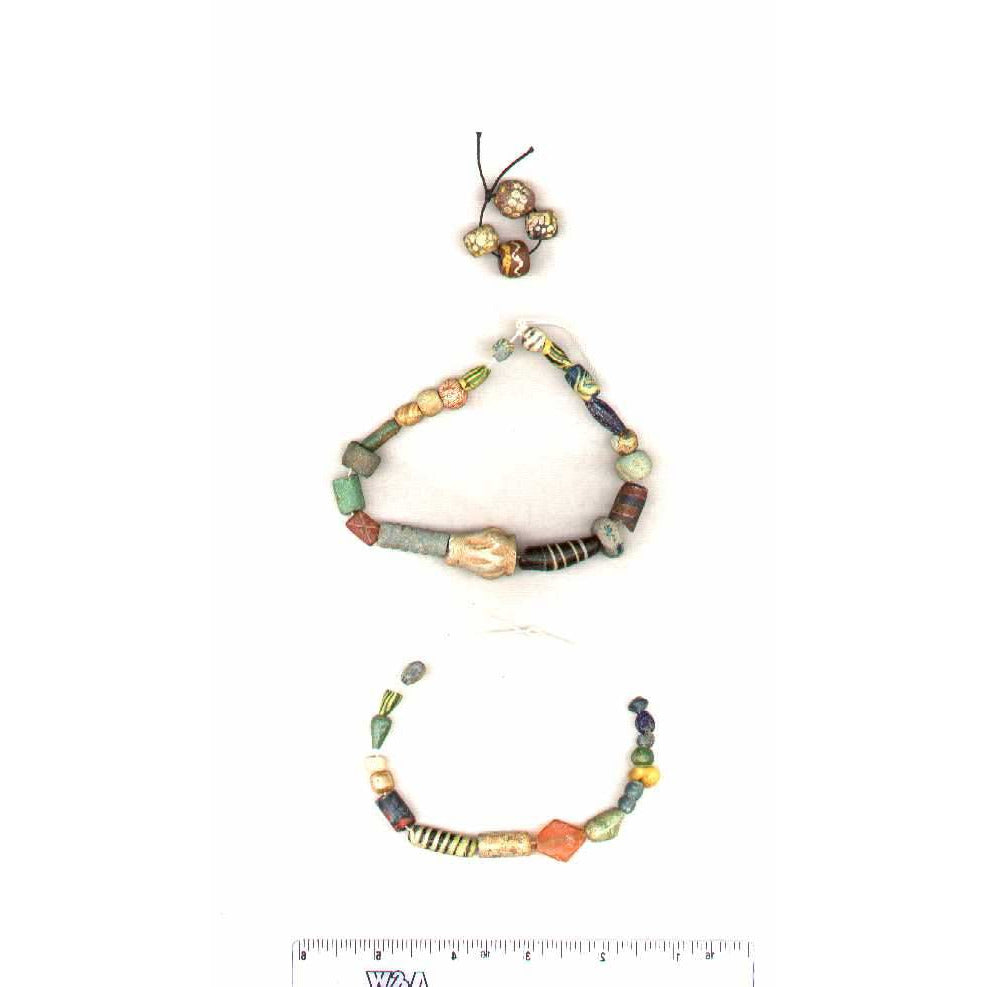 4 ancient eye beads made of glass, Roman or Egyptian