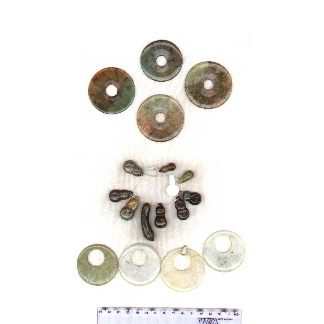 Antique jadeite beads, group of 9