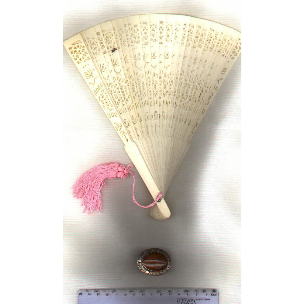 Antique fan, intricately designed