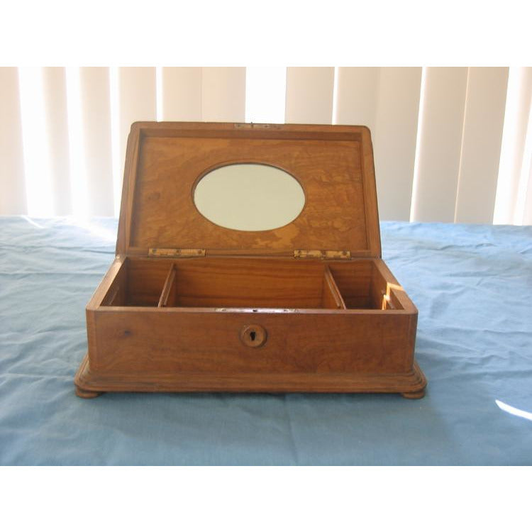 Large antique wooden box with mirror