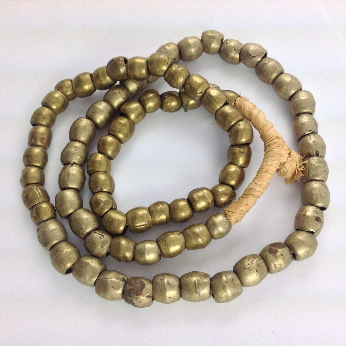 Nicely Worn Vintage Medium Nigerian Metal Brass Color Beads from the African Trade - AT1022