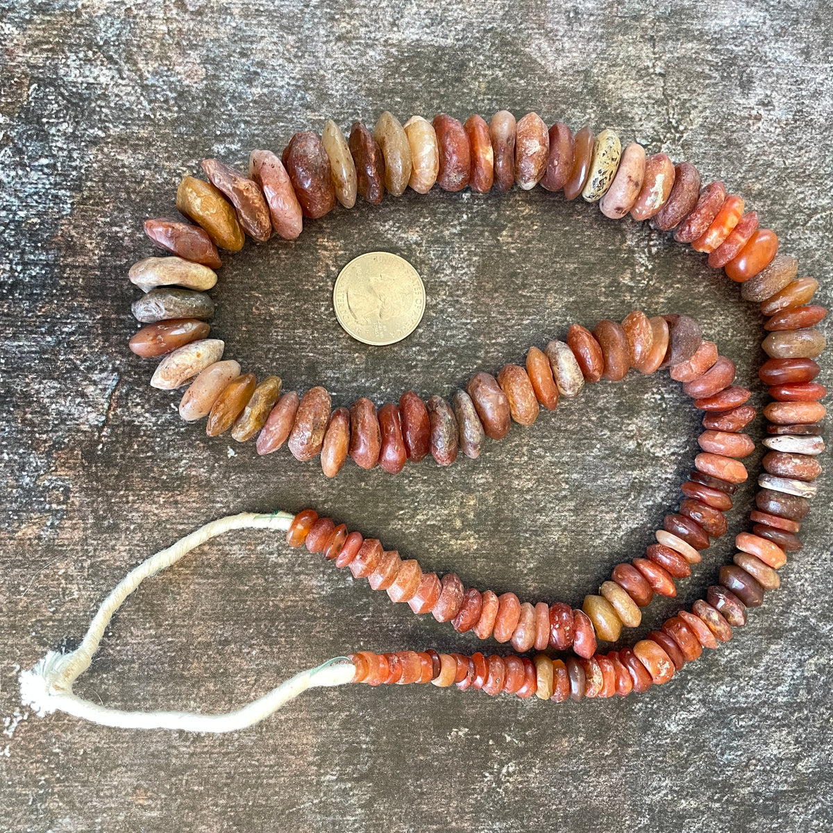 Graduated Neolithic Period Red Carnelian Stone Disc Beads from the Saraha - Rita Okrent Collection (S588)