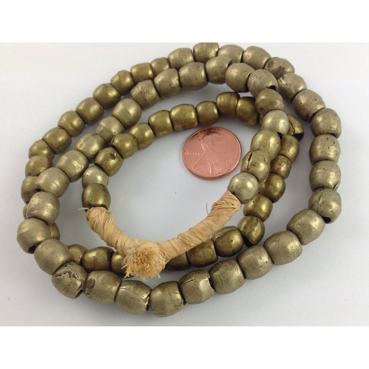 Nicely Worn Vintage Medium Nigerian Metal Brass Color Beads from the African Trade - AT1022