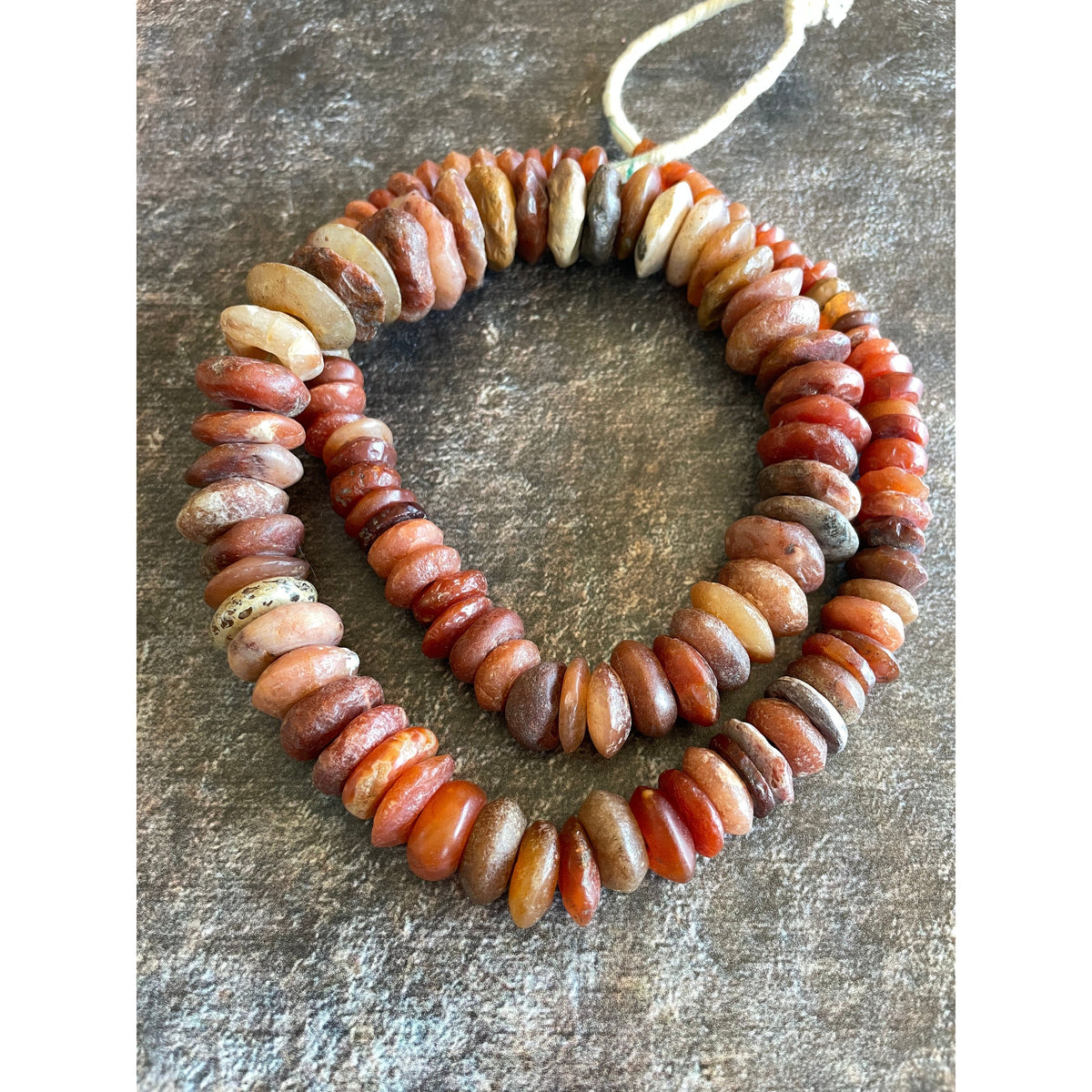 Graduated Neolithic Period Red Carnelian Stone Disc Beads from the Saraha - Rita Okrent Collection (S588)