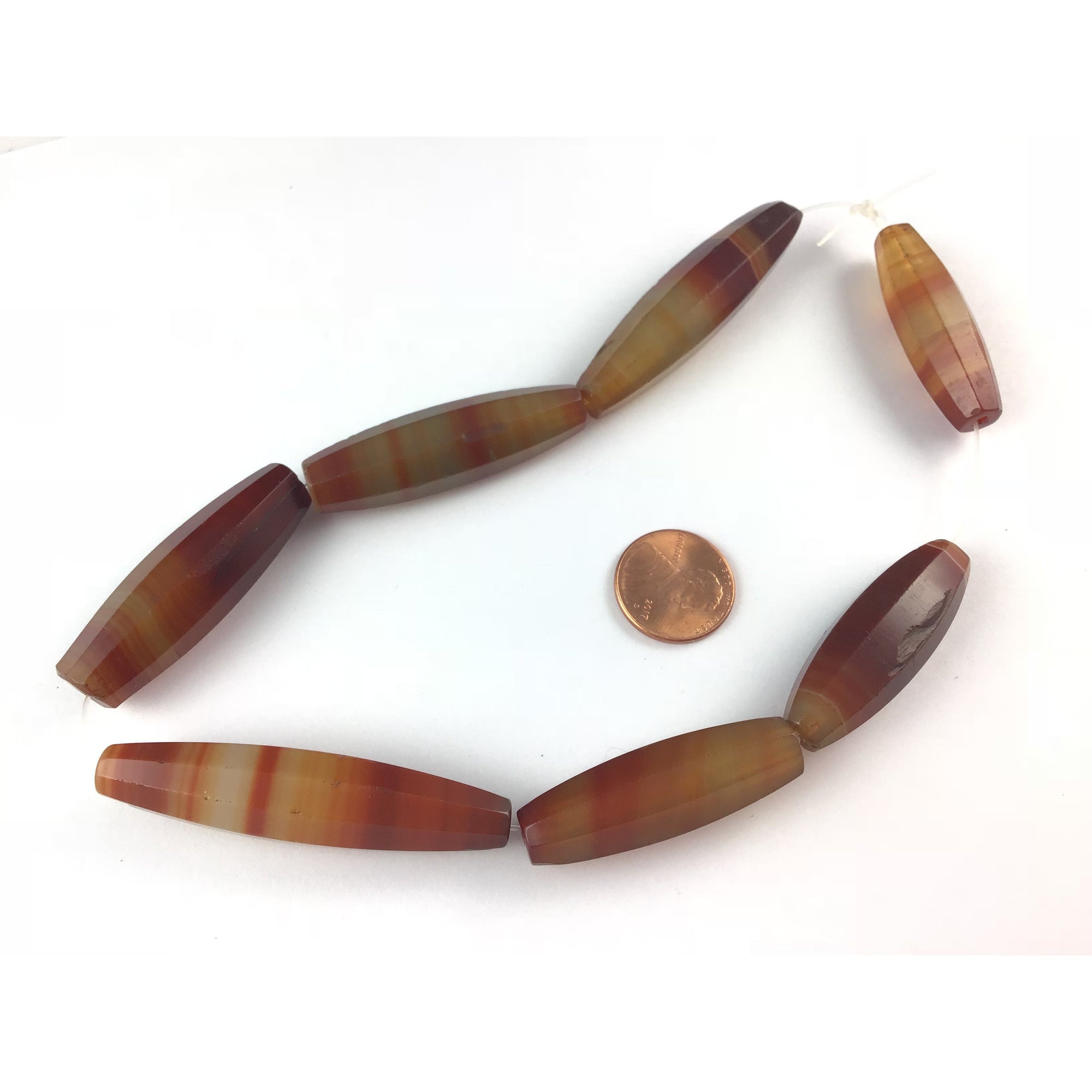 Three Antique Idar-Oberstein Banded Agate Beads