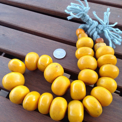 Strand of Large Yellow Orange Moroccan Faux Amber Beads - NP034