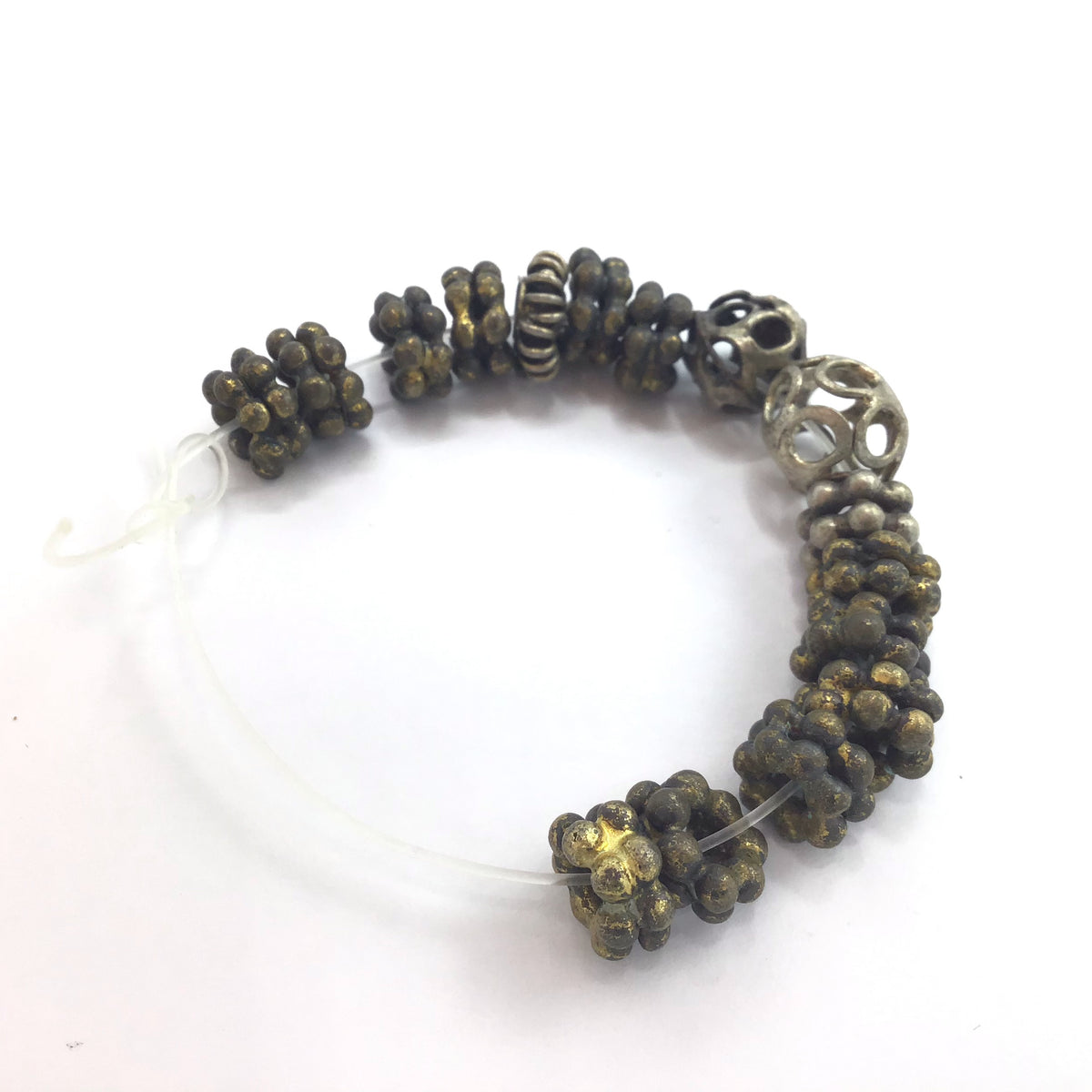 Short Strand of 16 Mixed Brass and Metal Spacers and Beads - Rita Okrent Collection (ANT297)