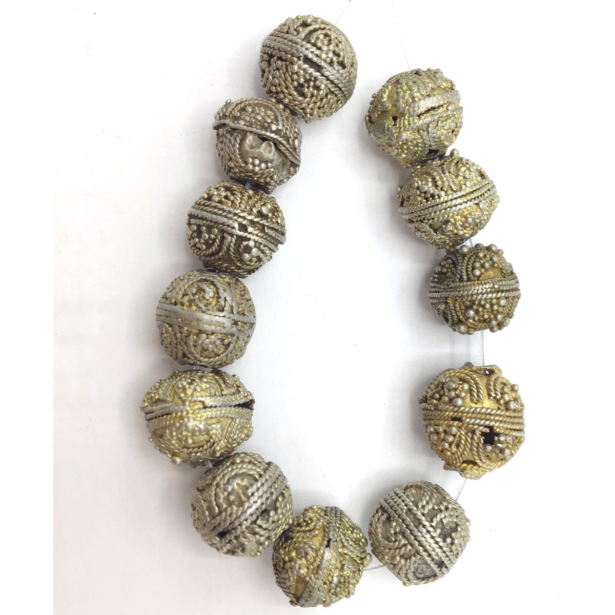 Strands of 12 Mixed Favorite Silver and Gilded Silver Mauritanian Beads - Rita Okrent Collection (C469)