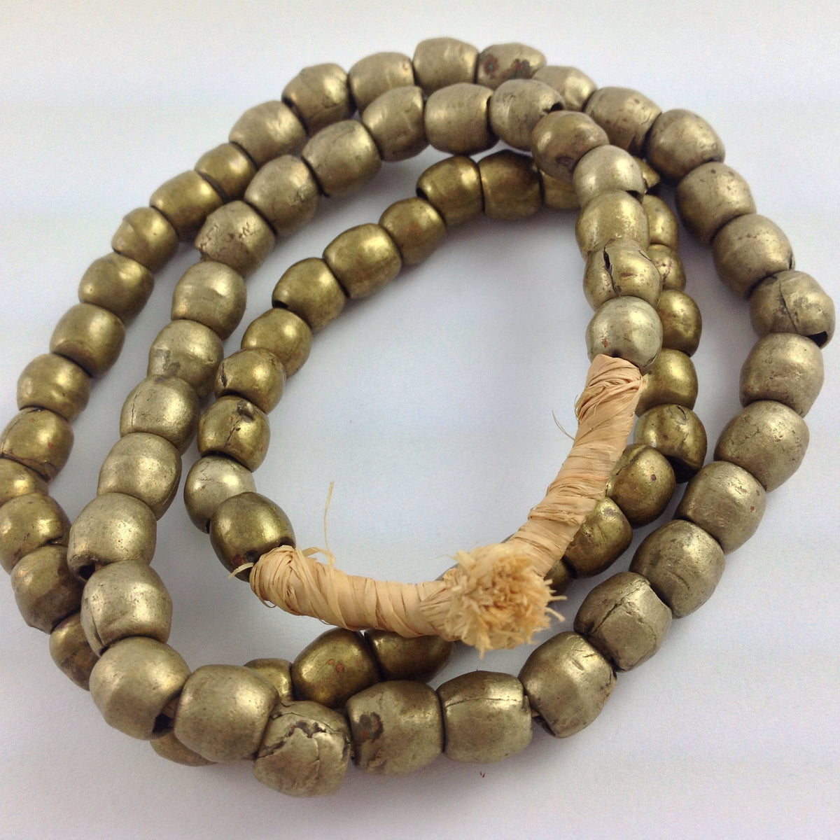 Nicely Worn Vintage Medium Nigerian Metal Brass Color Beads from the African Trade - AT1022