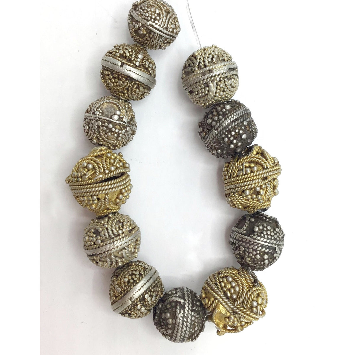 Strands of 12 Mixed Favorite Silver and Gilded Silver Mauritanian Beads - Rita Okrent Collection (C469)