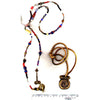 Lariat necklace, made of collection of African Trade beads and brass ends