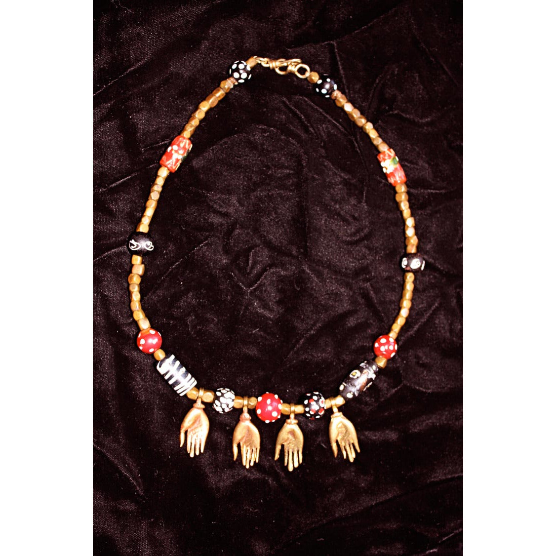 Antique copper beads and brass hands with antique beads~from the African Trade