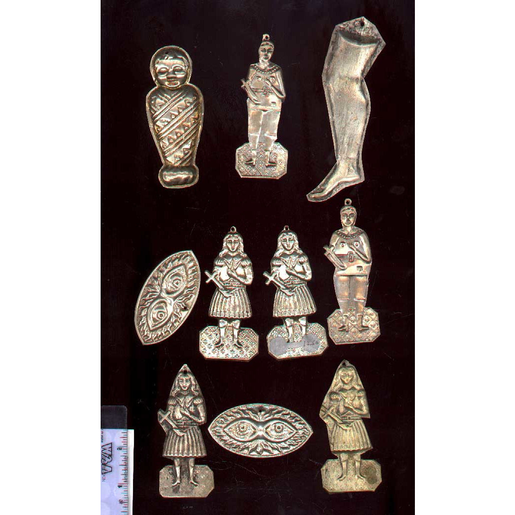 Milagros, silver. Also known as ex-votive figures. Bottom row, group of 3