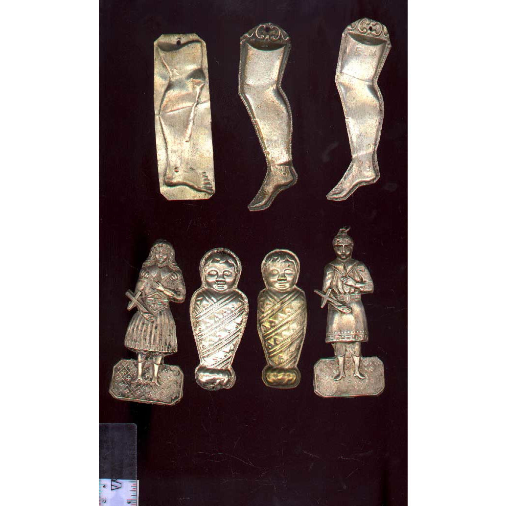 Milagros, silver. Also known as ex-votive figures. Top row, group of 3