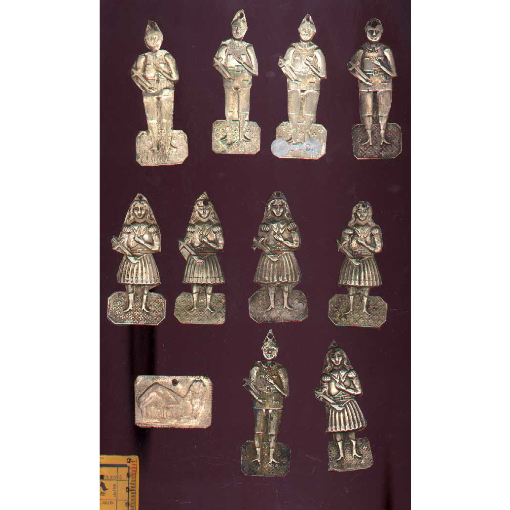 Milagros, silver. Also known as ex-votive figures. Bottom row, group of 3