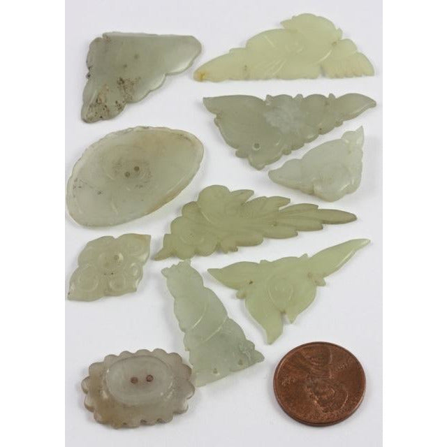 Old carved Chinese jade and jadeite buttons, (group of 10)