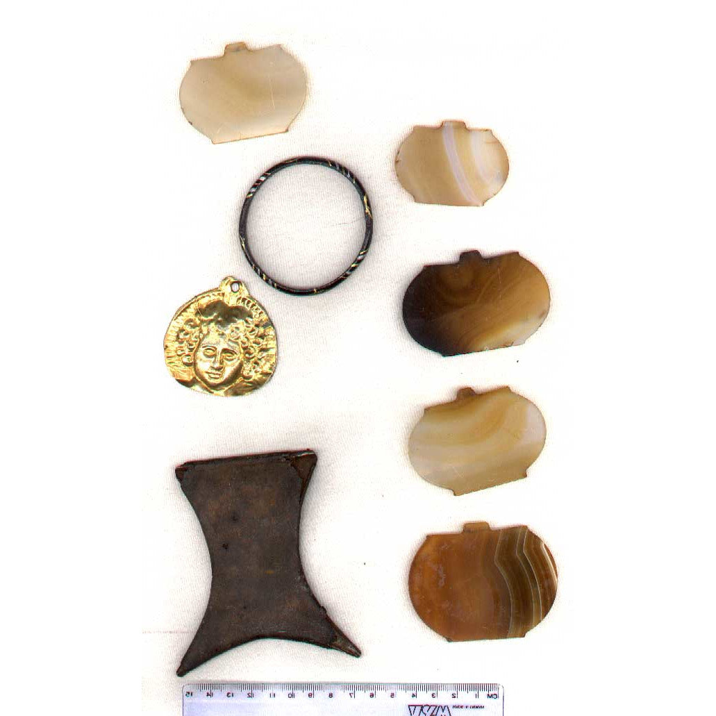 Gold colored face pendant