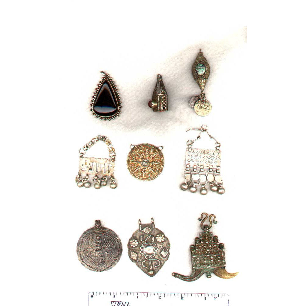 Antique silver/metal pendant with tassles