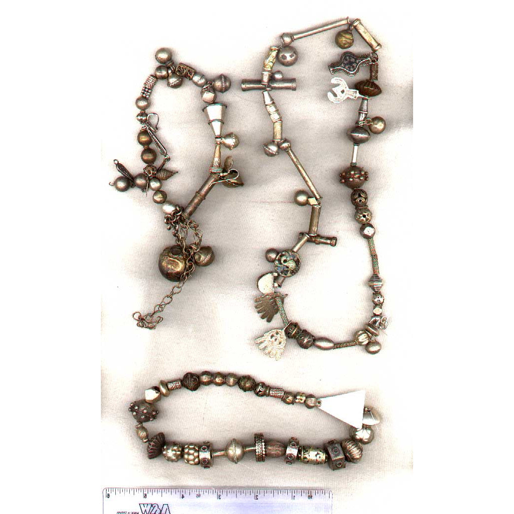 Antique silver pendants and beads, Middle East