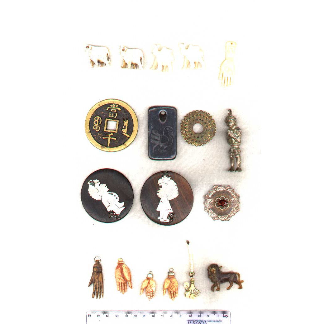 Group of 4 pendants, 2nd row, including metal figure and Chinese coin pendant